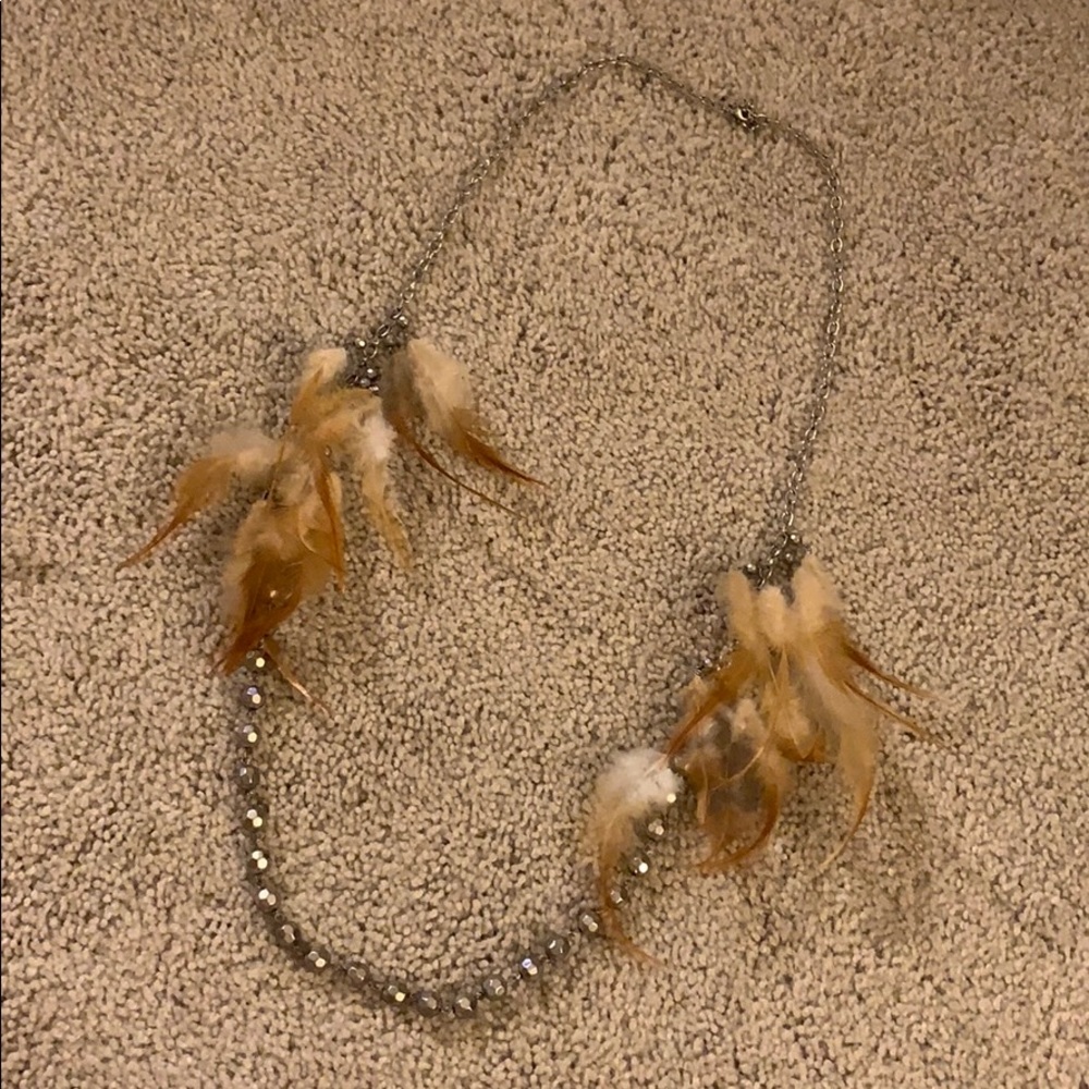 Silver necklace with feathers